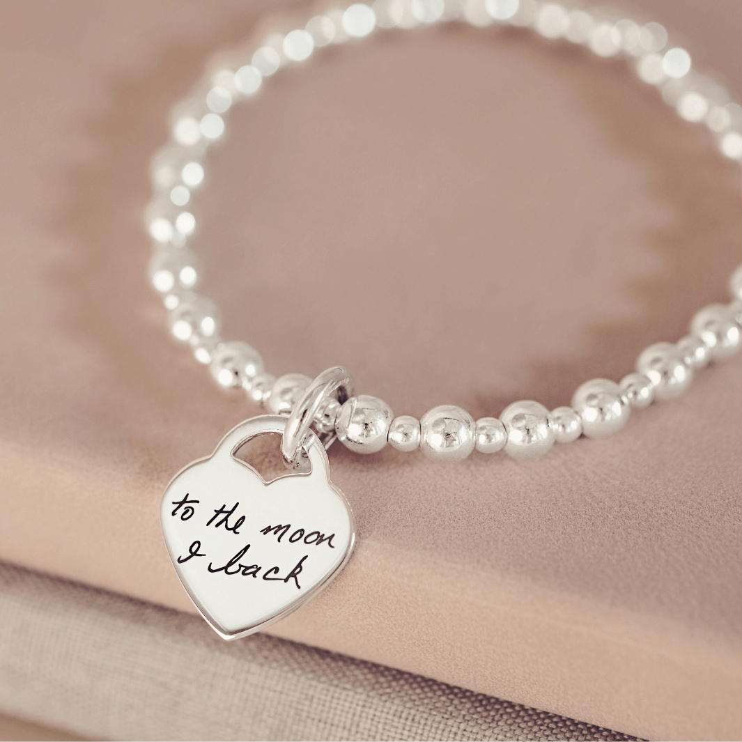 Handwriting on a charm bracelet