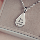 Reverse of a Memorial Ashes Teardrop showing a message in script font reading 'Dad always with me'