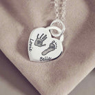 Handprint and Footprint on a necklace