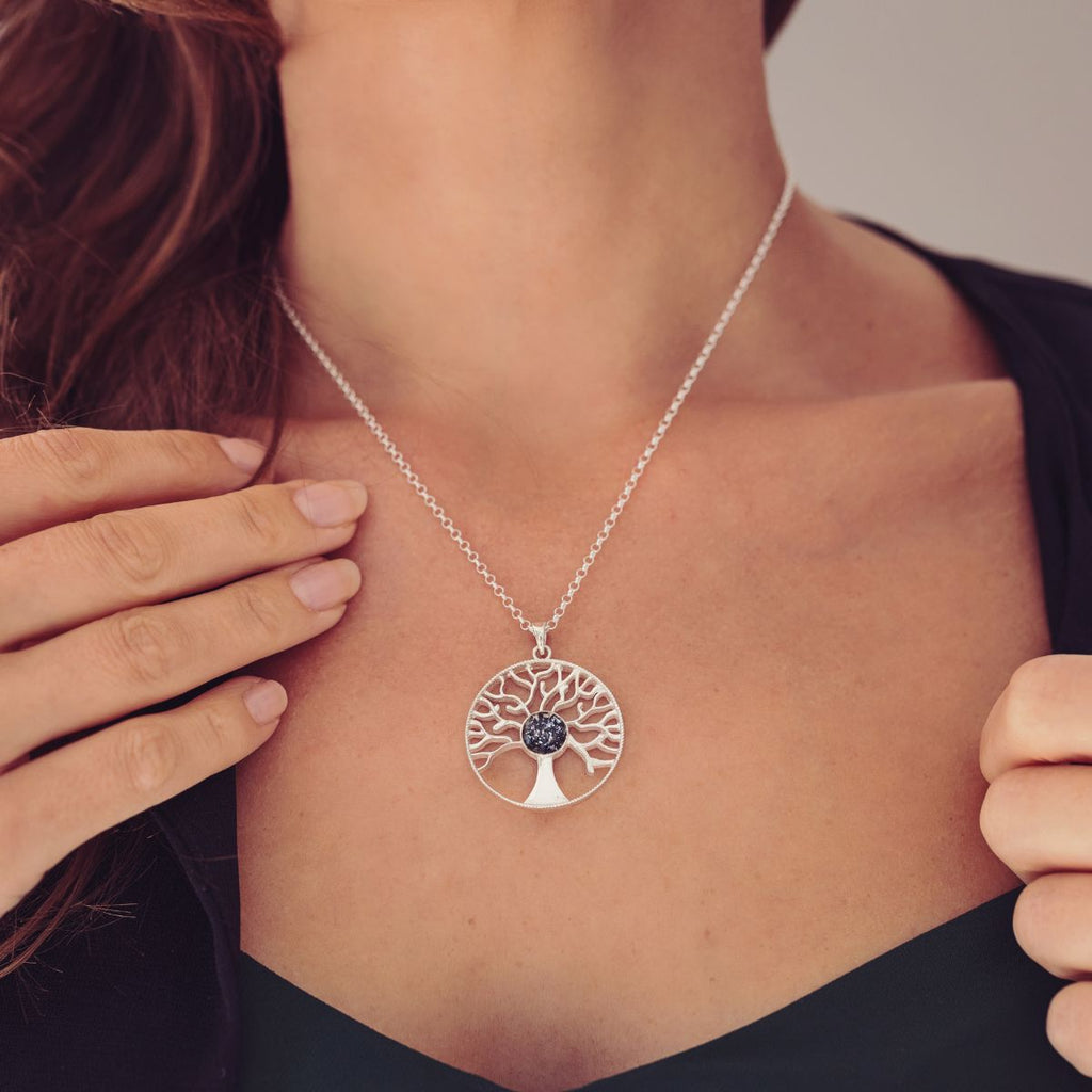 Tree of Life necklace in a rhodium plated setting with flowers