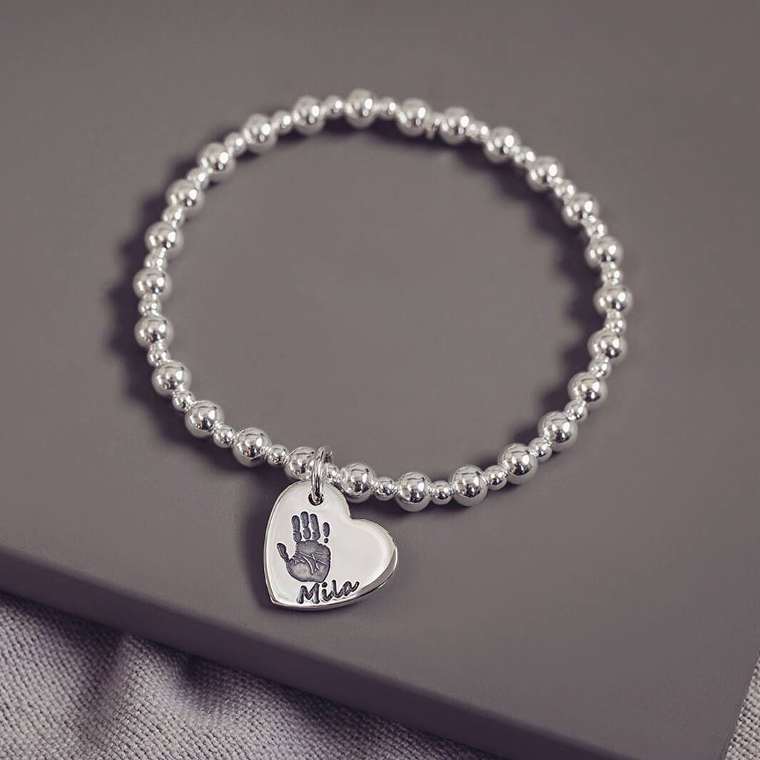 handprint silver charm bracelet